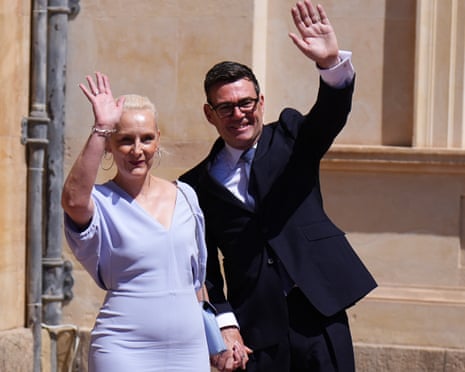 Andy Burnham and his wife, Marie-France van Heel, outside Buckingham Palace