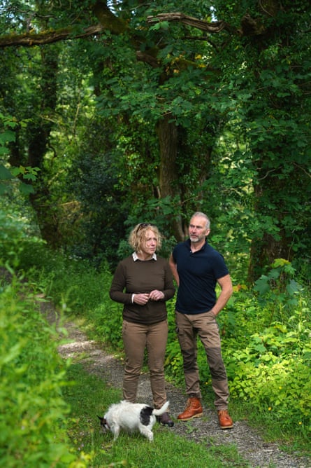 Hutton and Burton on a path with a dog
