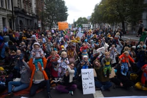 Mothers stage a mass breastfeeding protest as part of the Extinction Rebellion demonstrations on Whitehall in London in October 2019.
