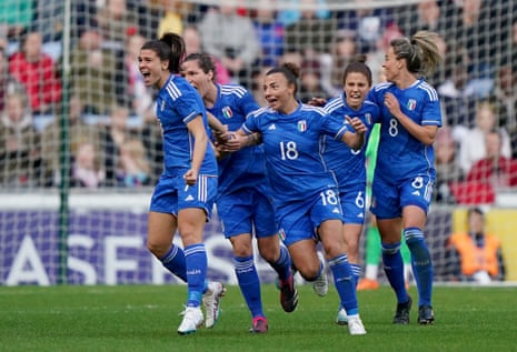 Italy’s Sofia Cantore (left) celebrates scoring.