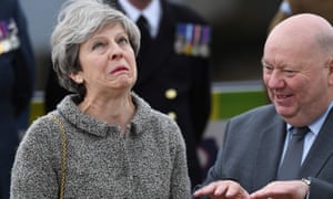 Theresa May and the mayor of Liverpool, Joe Anderson, watch a parade of military personnel to mark Armed Forces Day in Liverpool last week