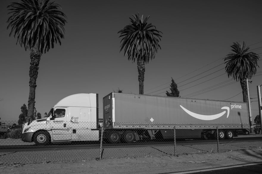 An Amazon truck drives through Ontario.