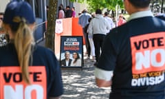 'Vote no' volunteers at a voice referendum polling centre in Canberra last October