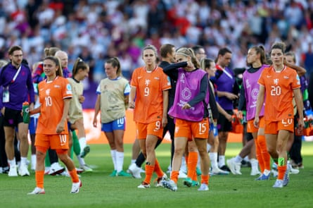 Katja Snoeijs (No 15) looks dejected on pinch her Netherlands teammates aft conclusion to England astatine Euro 2025