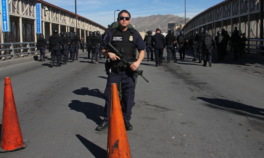 US customs agents at the border between El Paso, Texas and Ciudad Juárez, Mexico.