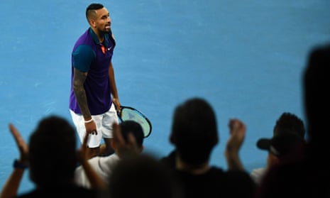 Fans cheer after an exhausted looking Nick Kyrgios after his five set victory over Ugo Humbert.