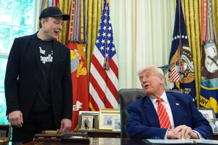 Trump speaks during a news conference with Musk in the Oval Office.