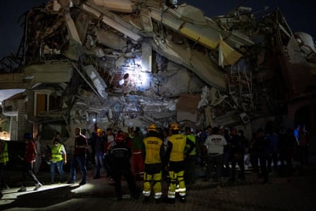 people inside of a damaged building