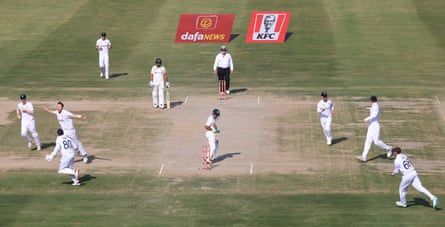 England's Ollie Robinson celebrates Babar Azam.