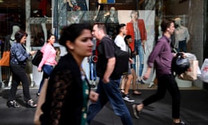 People are seen at Pitt Street mall in Sydney, 6 March 2017.