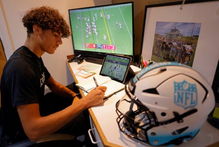 Rafael Varona-Blakstad, a wide receiver from west London, writes into the notebook he uses to memorise certain plays in his Academy accommodation at Loughborough College.