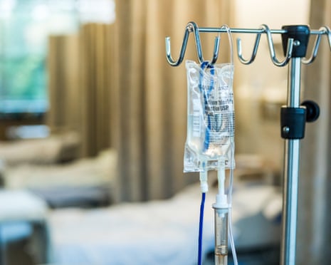 an IV bag in a hospital room