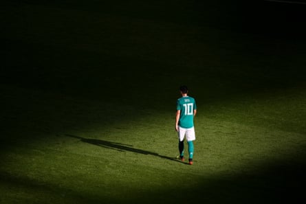Mesut Özil trudges off the pitch after Germany’s defeat by South Korea in 2018.