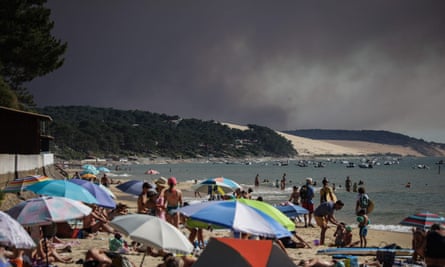 Black smoke visible from beach