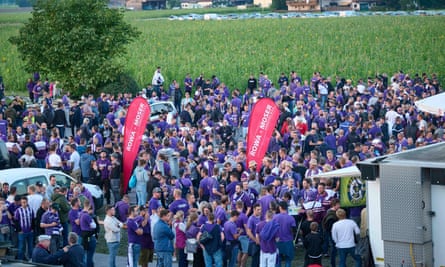 Austria Salzburg fans outside the stadium in their club’s distinctive violet-and-white colours