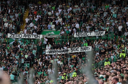 Celtic fans clasp up banners successful nan stands showing their dissatisfaction pinch nan club’s board.