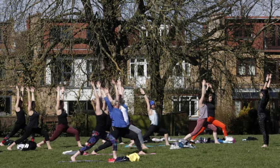 Exercising in a London park after the easing of England’s lockdown rules