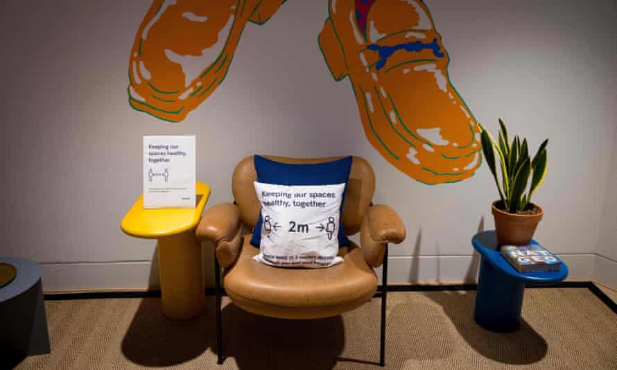 Signage advising people to maintain a two-metre physical distance is seen at a WeWork co-working and office space in the City of London Signage advising people to maintain a two-metre physical distance is seen at a WeWork co-working and office space in the City of London