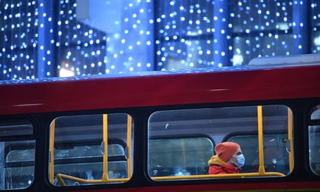 A man on a bus in Oxford Street in London. 