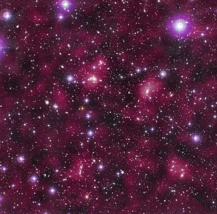 A image of the Abell 901/902 supercluster of galaxies, with the magenta patches representing dark matter.