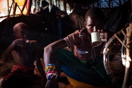 William Lenanyekie has cup of tea with fresh goats’ milk for breakfast. He doesn’t want to go back to school. ‘This is our life now,’ he explains. ‘I prefer to stay here, and do something useful.’