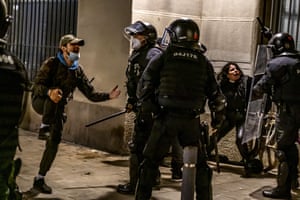 Regional police clash with protesters in Barcelona during a sixth night of protests and riots after the arrest and imprisonment of rapper Pablo Hasél