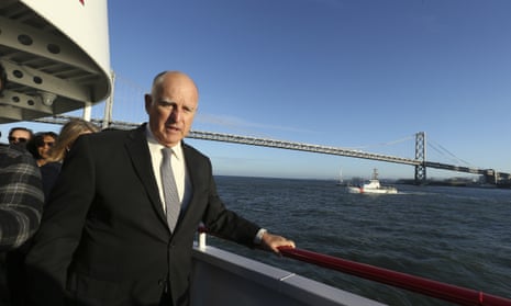 California Gov. Jerry Brown walks to the bow of the high-tech battery-operated San Francisco Bay sightseeing boat, Enhydra, for a cruise of San Francisco Bay, where he signed 16 new laws aimed at easing global warming Thursday, Sept. 13, 2018, in San Francisco. 