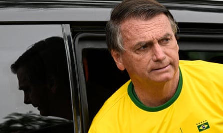 Brazilian president and re-election candidate Jair Bolsonaro arrives at a polling station to vote in Rio de Janeiro.