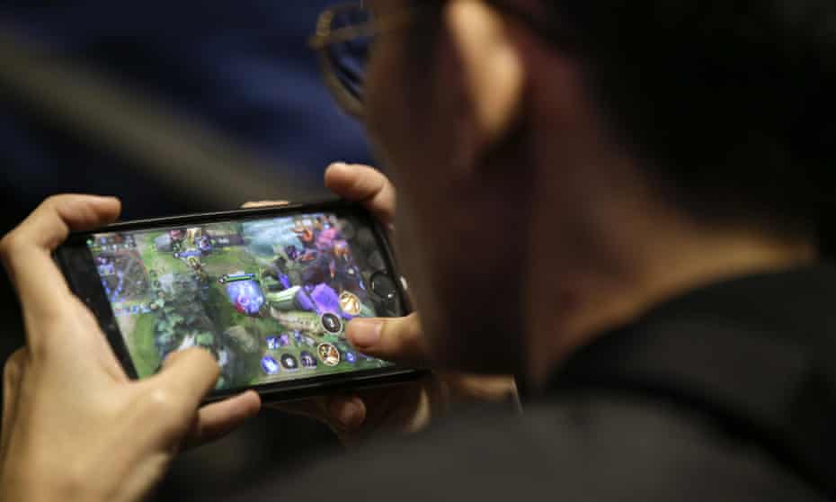 esport player plays on his smartphone
