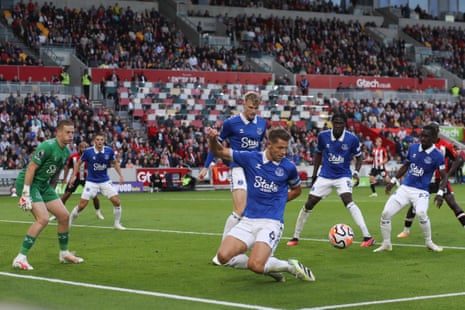 James Tarkowski of Everton clears the ball as Everton defend in numbers at Brentford.