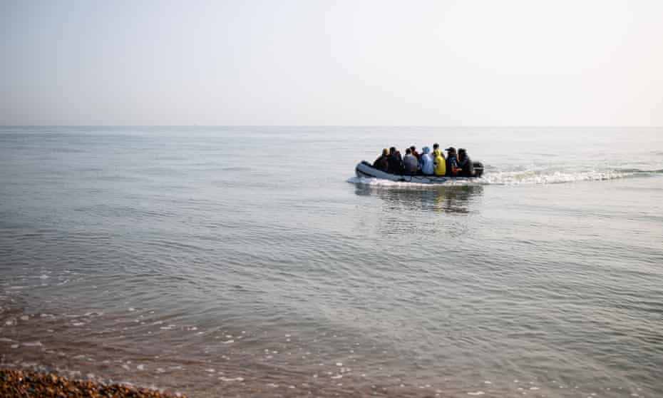 Migrants landing on a Kent beach in September. 