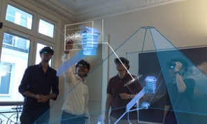 The ScanPyramids team examining an augmented reality review of the newly-discovered void.