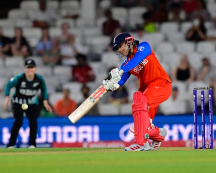 The England batter Sophia Dunkey plays a drive in her team's Women's T20 World Cup 2026 game against New Zealand.
