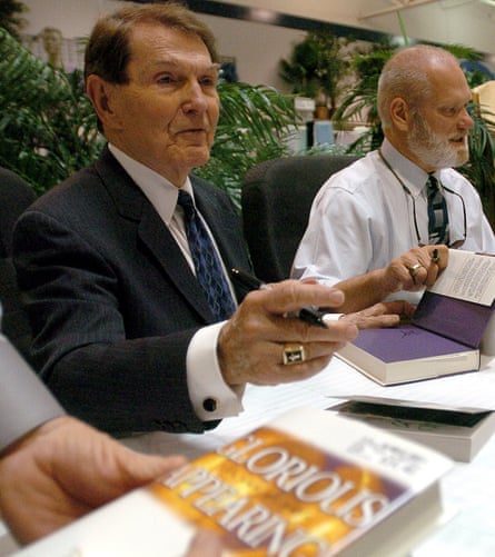 Co-authors Tim LaHaye, left, and Jerry Jenkins sign copies of their book Glorious Appearing.