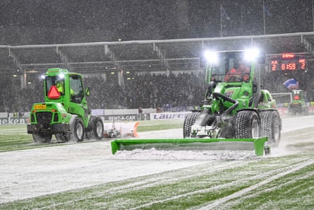 A break in play near the end to clear snow off the pitch in Helsinki.