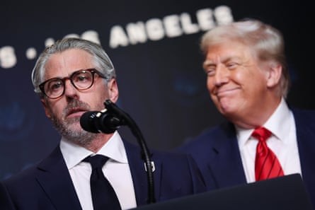 a man smiling at another man