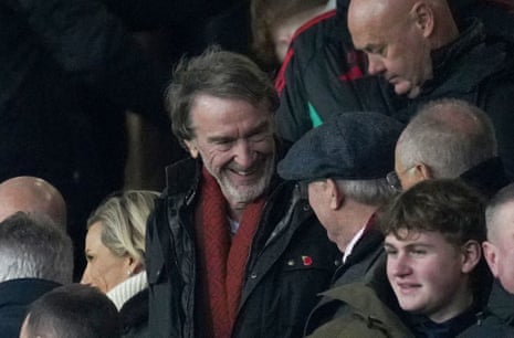 INEOS Sport CEO Sir Jim Ratcliffe speaks to Sir Alex Ferguson in the stands.