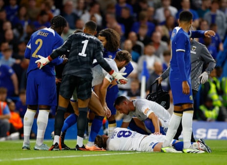 Chelsea v AFC Wimbledon, PSV v Rangers: Carabao Cup and Champions League – live | Soccer 8 Harry Pell receives medical attention after sustaining an injury.