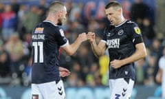 Scott Malone and Murray Wallace celebrate Millwall’s point.