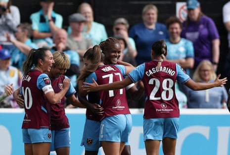 Kelly Gago receives the cvongrartulations of her West Ham teammates after firing her side ahead against London City Lionesses.