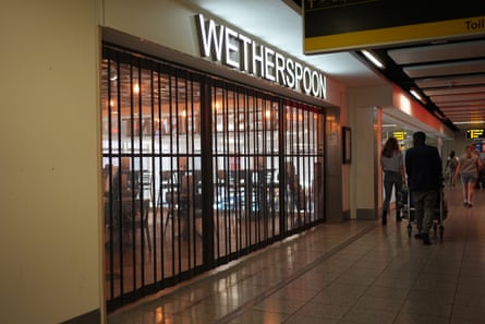 Shutters down on the entrance to the Wetherspoon pub at Gatwick airport.