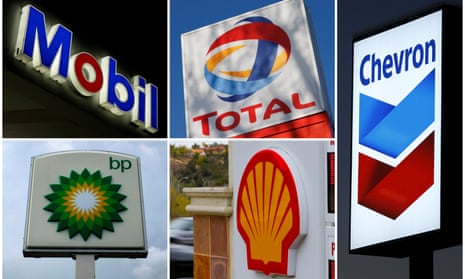 A combination of file photos shows the logos of five of the largest publicly traded oil companies - BP, Chevron, ExxonMobil, Royal Dutch Shell, and Total.