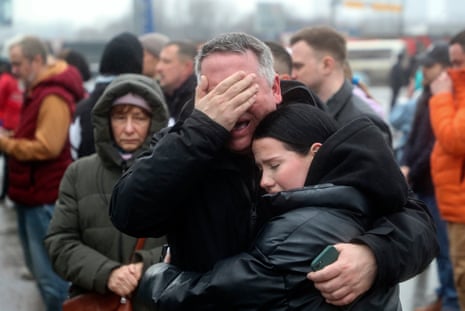People mourn at the Crocus City Hall concert venue in Krasnogorsk, outside Moscow.