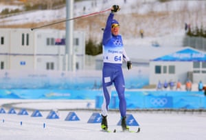 Finland’s Iivo Niskanen celebrates as he crosses the finish line.