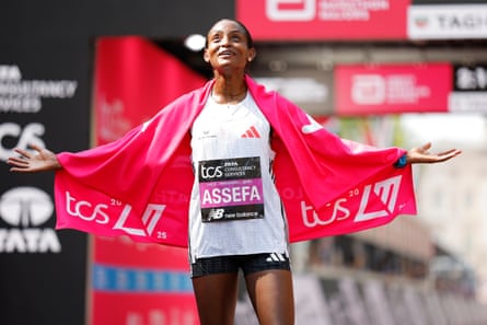 Tigst Assefa celebrates winning the women’s London Marathon in 2025.