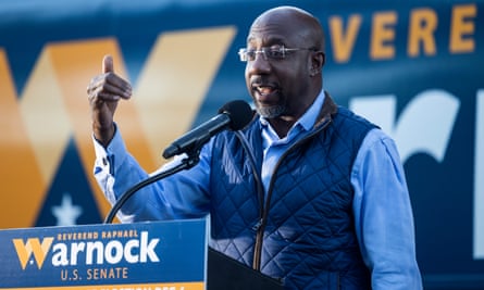 Democratic US Senate candidate Raphael Warnock campaigns in Savannah, Georgia.