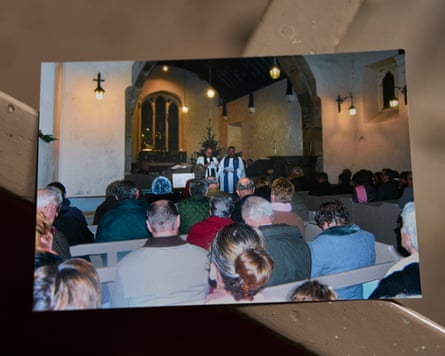 Picture of people sat down in the church