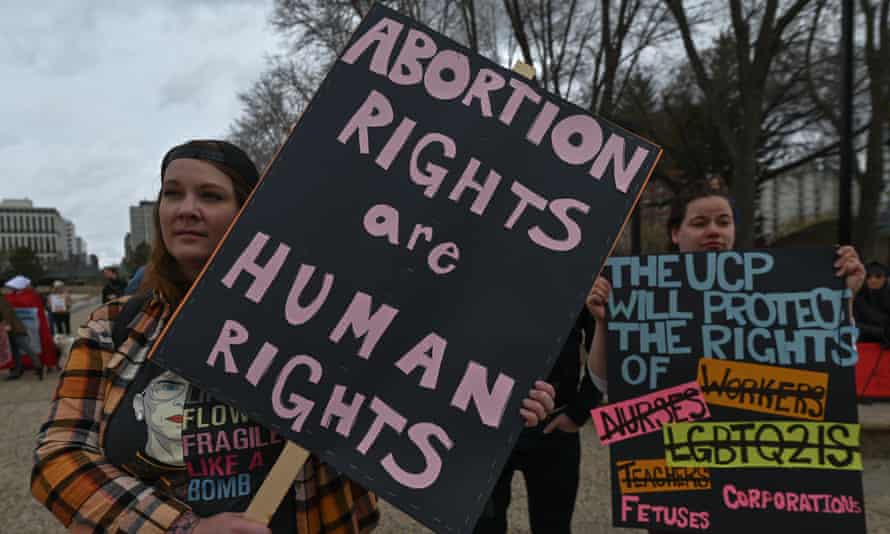 A pro-choice activist in Alberta, Canada, protests in solidarity with women in the US after the supreme court’s opinion was leaked.