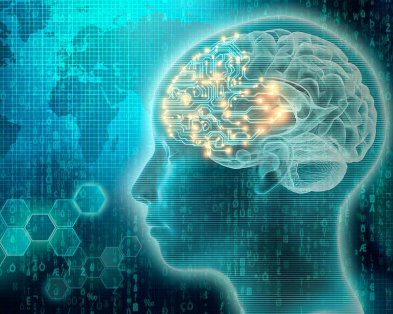 A futuristic illustration of the side profile of a human head with lights and computer-like detail in the brain.