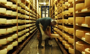 Wheels of cheese ripening at La Maison de L’Etivaz, Switzerland.